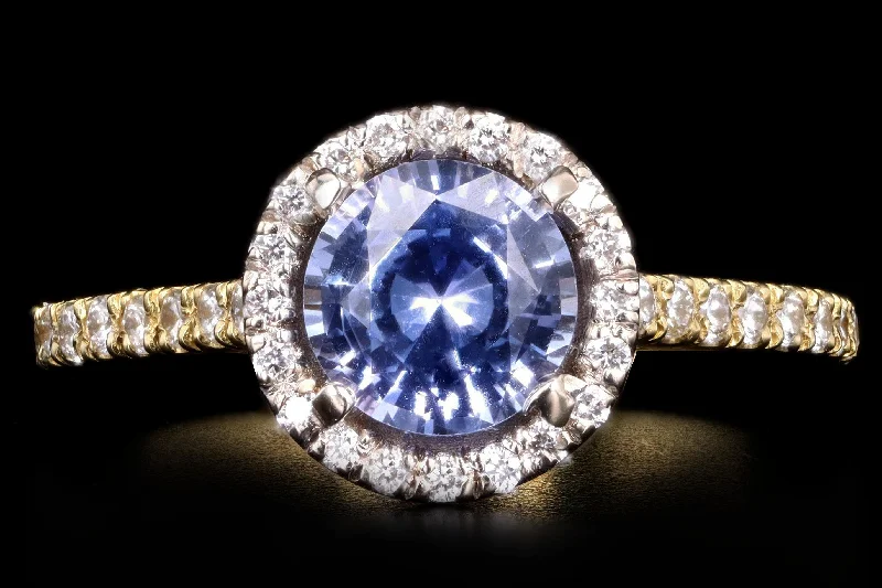 Modern 18K Yellow Gold 1.25 Carat Natural Sapphire and Diamond Ring