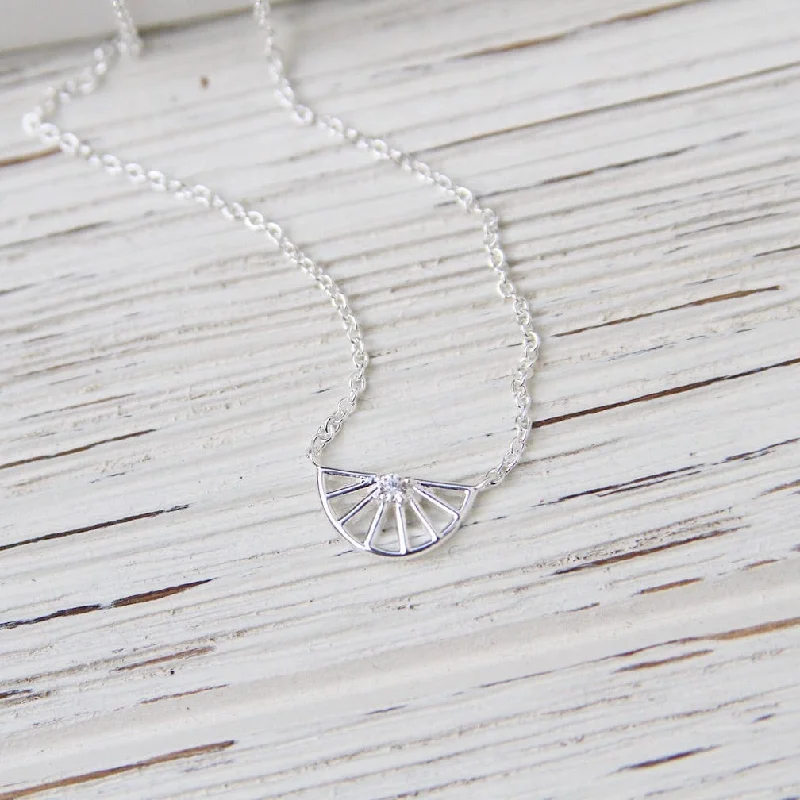 Sterling Silver Spoked Half Wheel with Center CZ Necklace